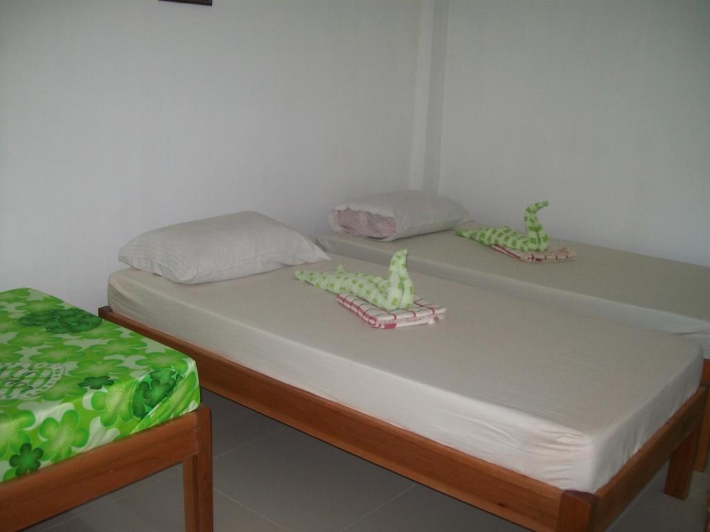 Charm Guest House Puerto Princesa Rum bild