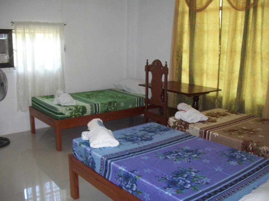 Charm Guest House Puerto Princesa Rum bild